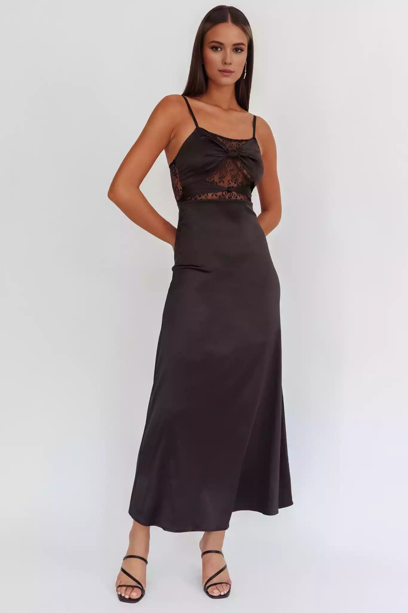 The eye-catching unlined twisted detail lace corset with adjustable shoulder straps and a zipper at the back Prom Dresses