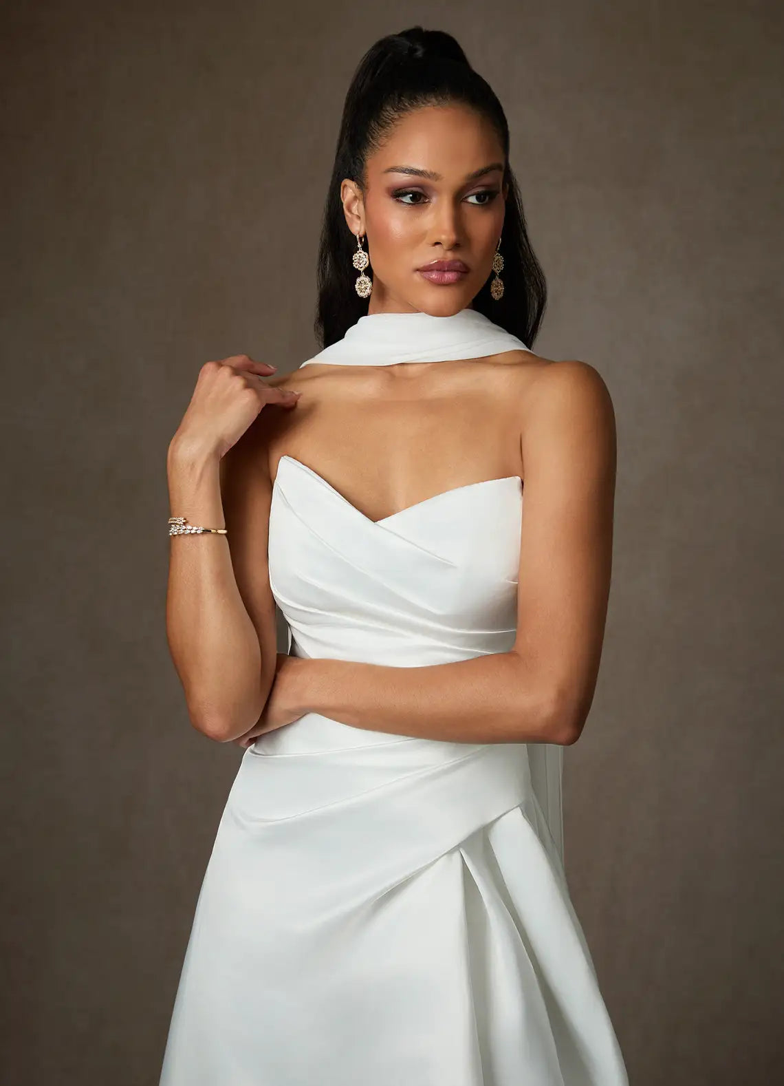 Voluminous ball gown skirt with dramatic train Strapless Sweetheart Satin Ball Gown Wedding Dress with Scarf Neck Detail
