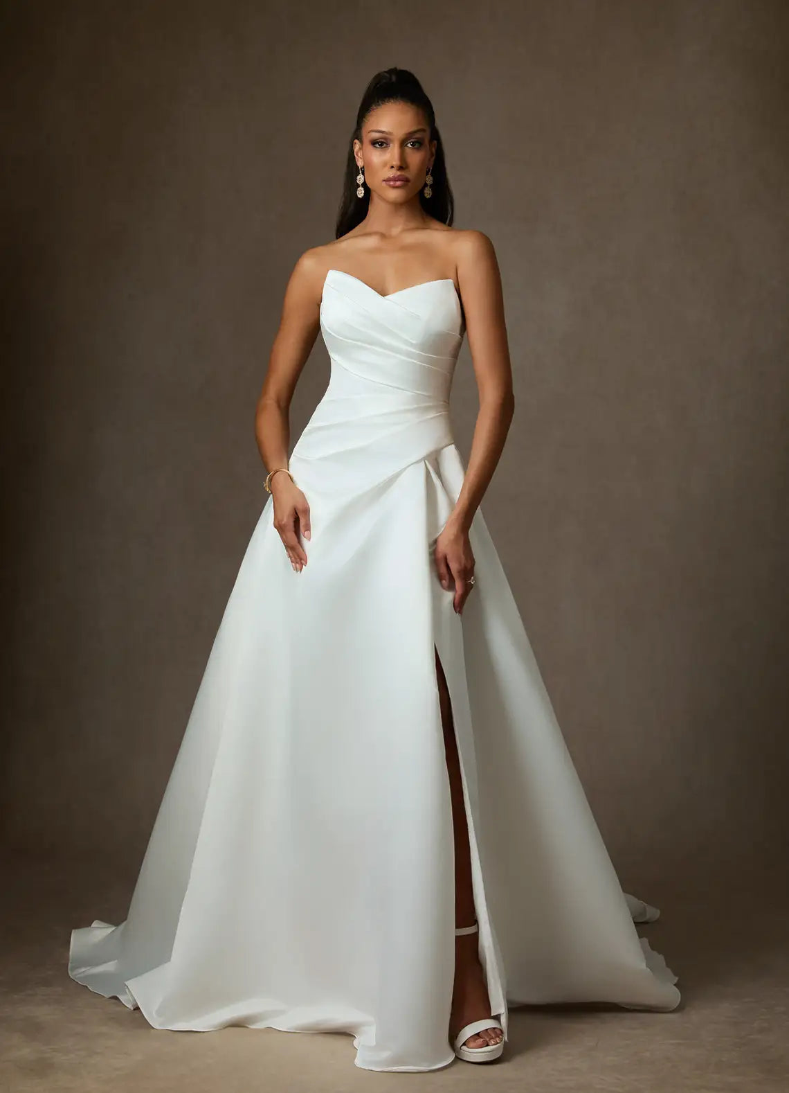 Voluminous ball gown skirt with dramatic train Strapless Sweetheart Satin Ball Gown Wedding Dress with Scarf Neck Detail