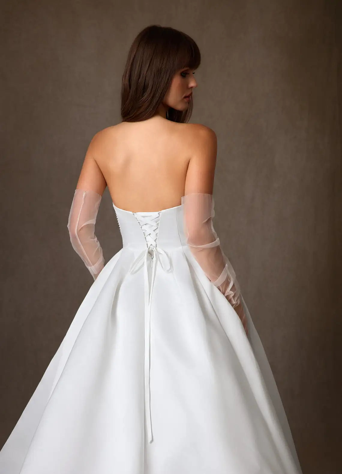 Voluminous ball gown skirt with subtle train Strapless Satin Ball Gown Wedding Dress with Floral Beaded Bodice