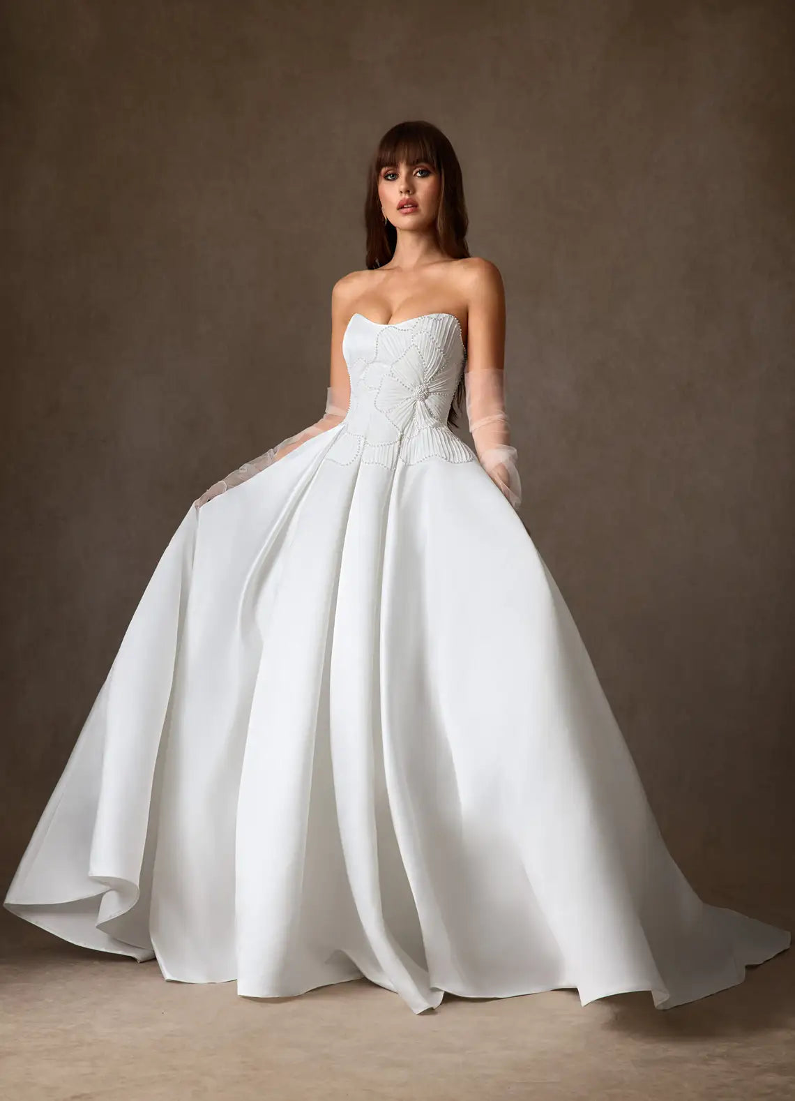 Voluminous ball gown skirt with subtle train Strapless Satin Ball Gown Wedding Dress with Floral Beaded Bodice