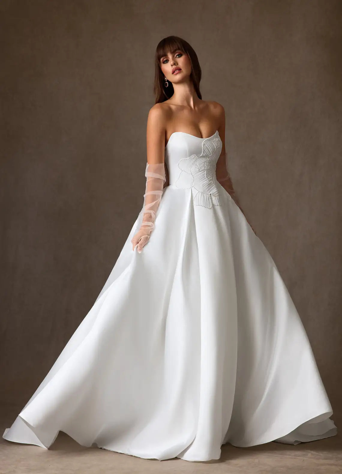 Voluminous ball gown skirt with subtle train Strapless Satin Ball Gown Wedding Dress with Floral Beaded Bodice