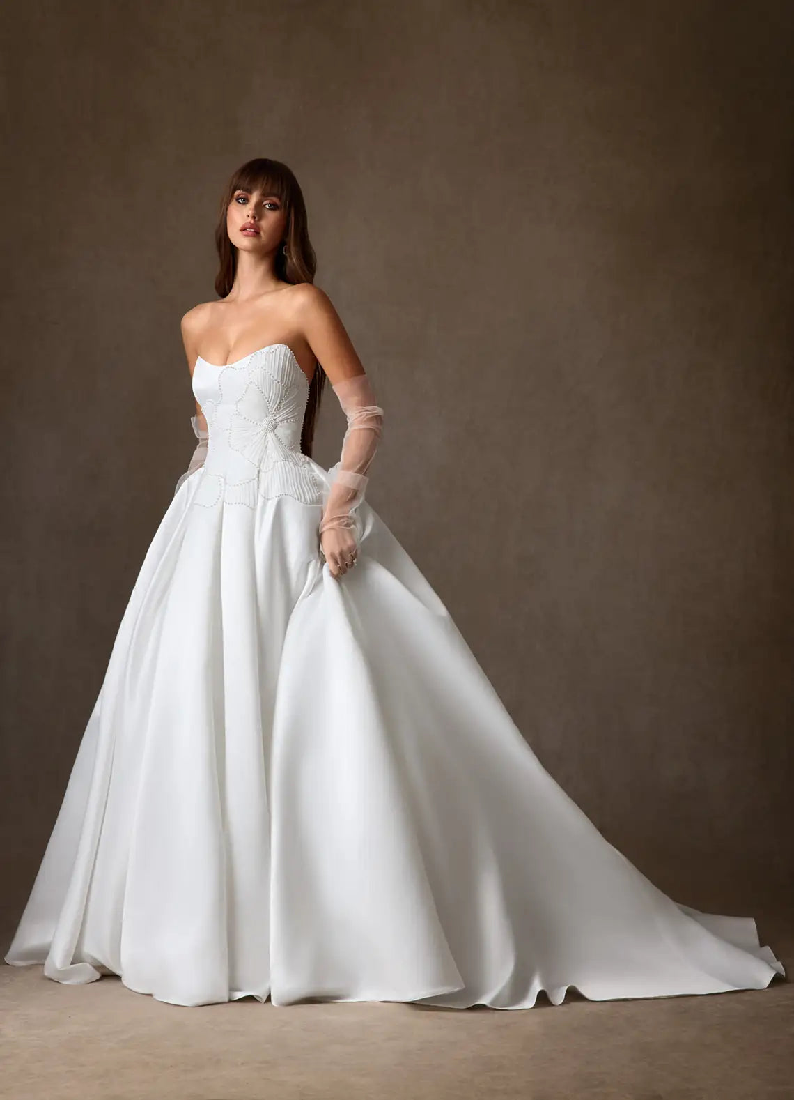 Voluminous ball gown skirt with subtle train Strapless Satin Ball Gown Wedding Dress with Floral Beaded Bodice