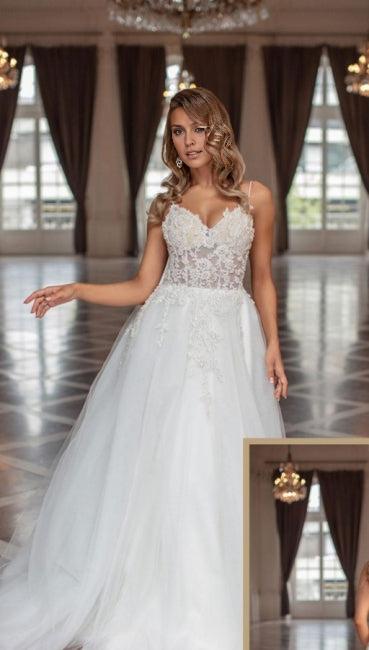 Long A-line V-neck sheer sleeveless lace bridal gown