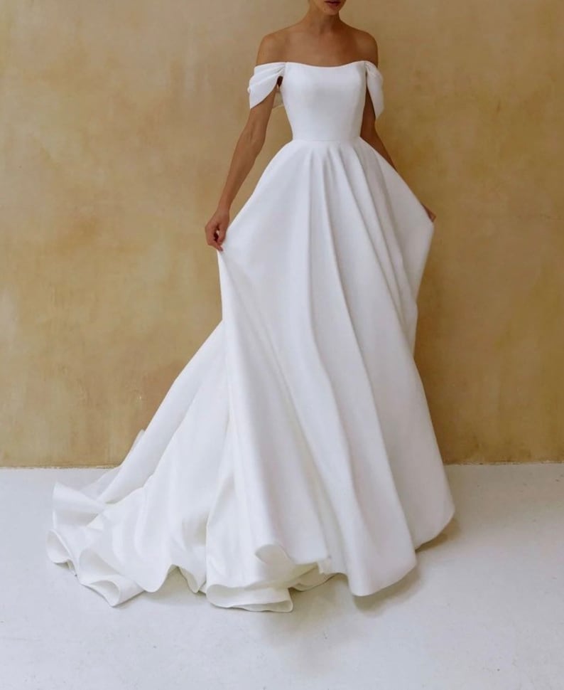 Dropped Sleeves Satin Wedding Dress Corset And Puffy Skirt With A Train Simple Satin Wedding Dress Simple Satin Dress Dress With Train