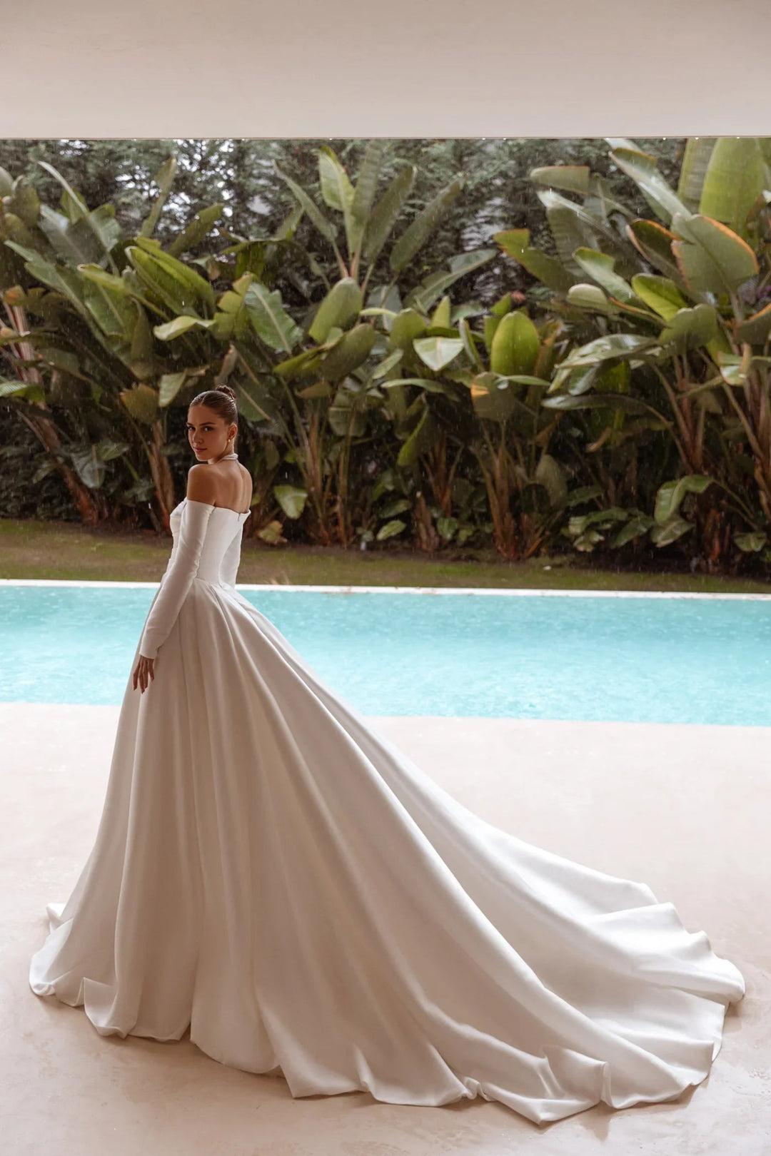 White Off-Shoulder Satin Wedding Dress with Long Sleeves and Floor-Length Train