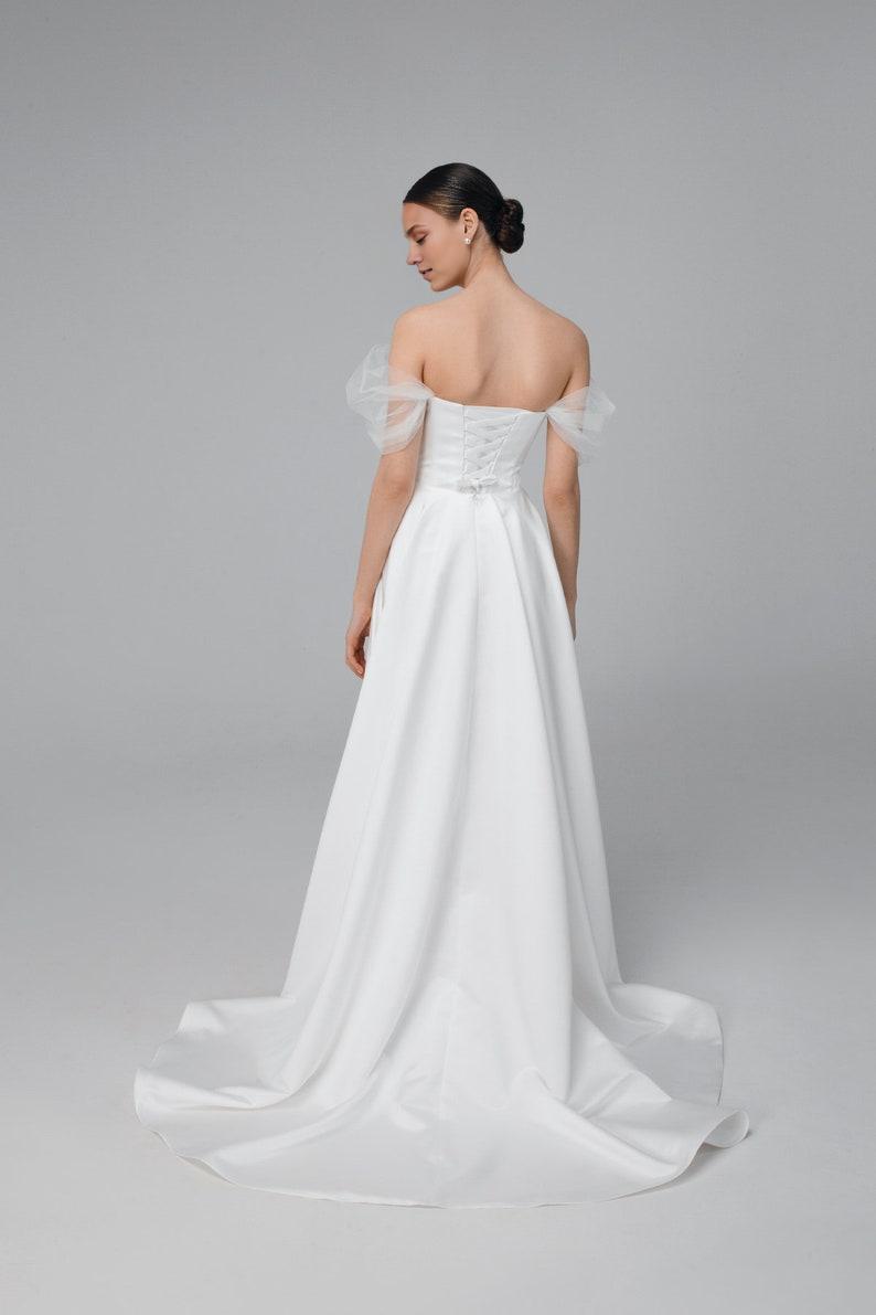 A Line Wedding Dress Made Of Satin Romantic And Modern Wedding Dress