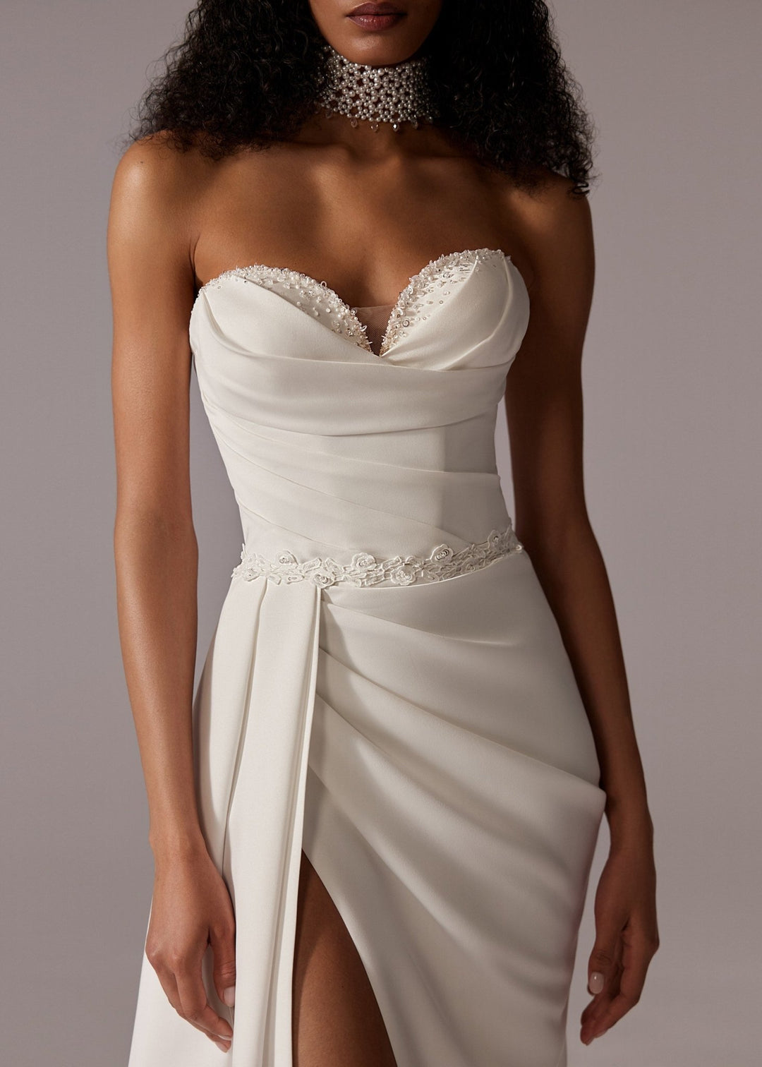 White Strapless Sweetheart Wedding Gown with High Slit and Floor Length Train