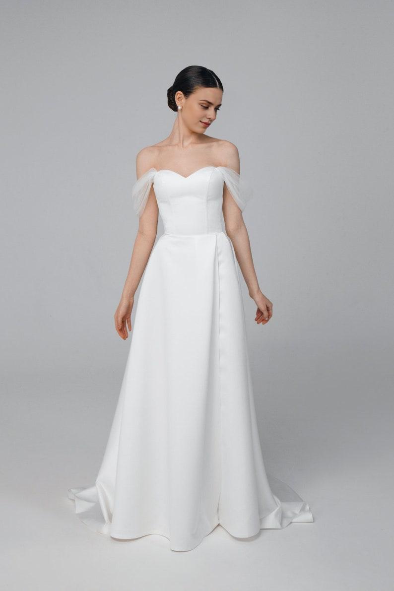 A Line Wedding Dress Made Of Satin Romantic And Modern Wedding Dress