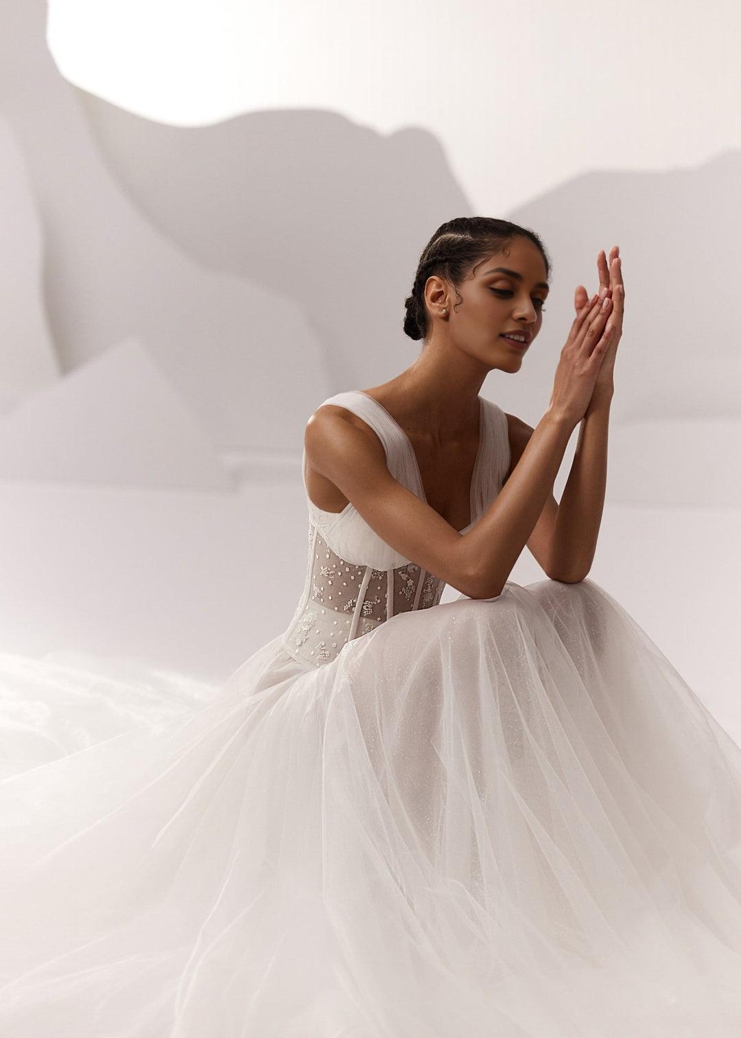 White Corset Bodice Tulle Wedding Dress with Plunging Neckline and Long Train