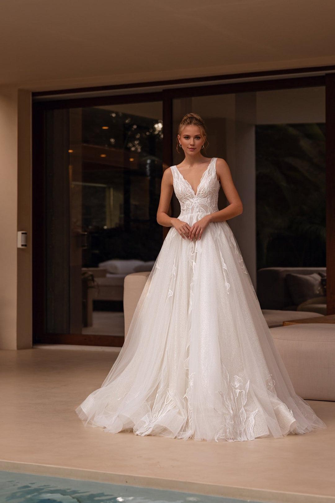 White V-Neck Lace Wedding Dress with Flowing Tulle Train