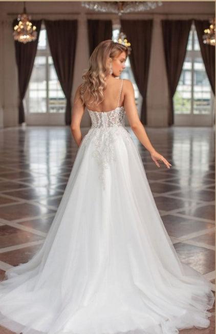 Long A-line V-neck sheer sleeveless lace bridal gown