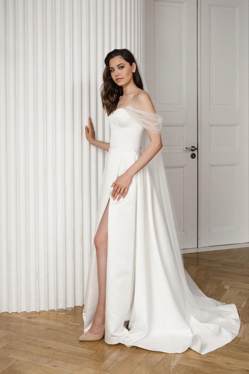 A Line Wedding Dress Made Of Satin Romantic And Modern Wedding Dress