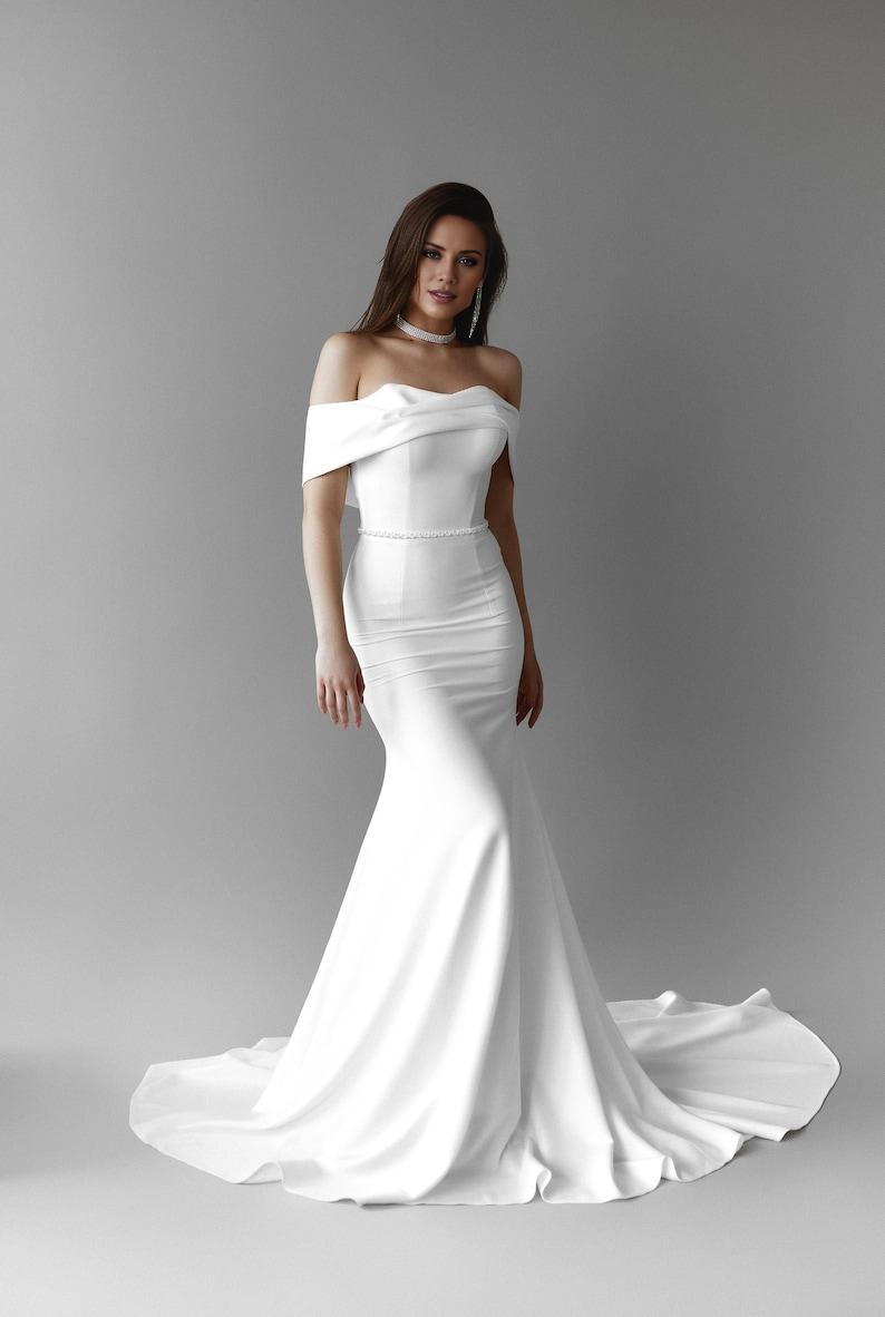Stunning Trailing Strapless White Wedding Dress