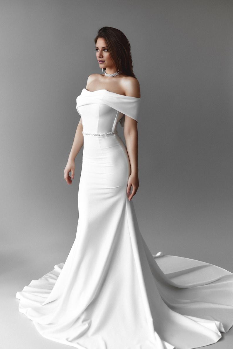 Stunning Trailing Strapless White Wedding Dress