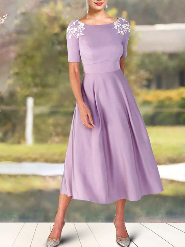 A-Line Mother of the Bride Dress Elegant Sweet Jewel Neck Tea Length Charmeuse Short Sleeve with Appliques