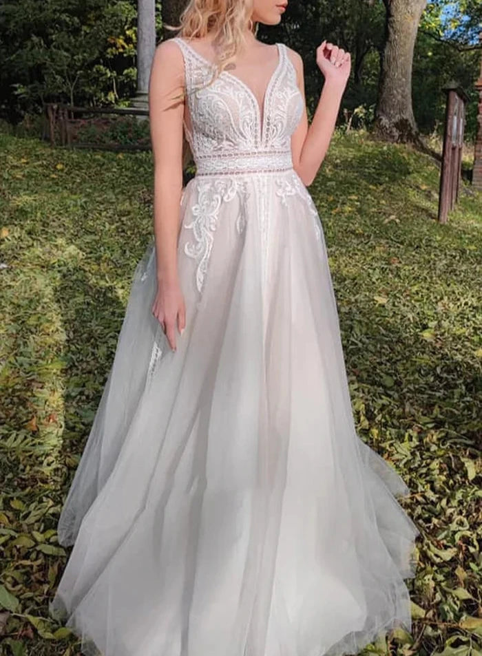 Sleeveless A-Line Lace Wedding Dress With V-neck And Low-V Back